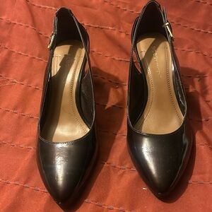 Patent leather brown buckle on side. Worn 2X